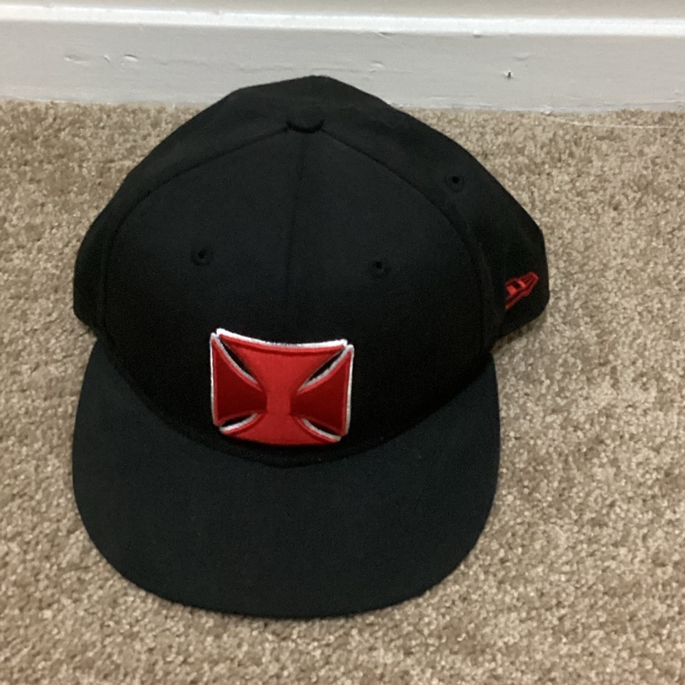 New Era Black Hat with Red Patch